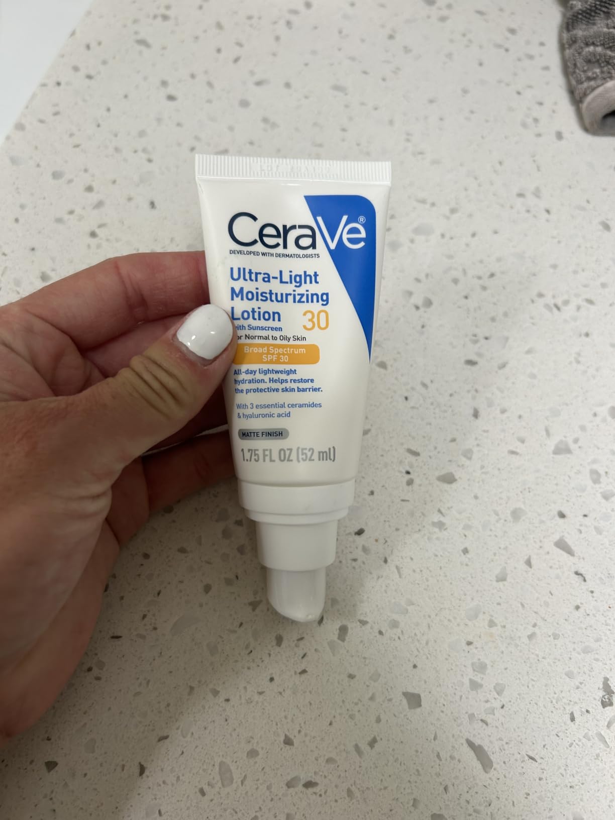CeraVe Ultra-Light Moisturizing Lotion SPF 30, Sunscreen for Face, 1.7oz | Skin Care, Face Moisturizer, Hyaluronic Acid, Sunscreen Lotion, Facial Moisturizer, Oil Free, Matte Finish, Ceramides customer photo 1
