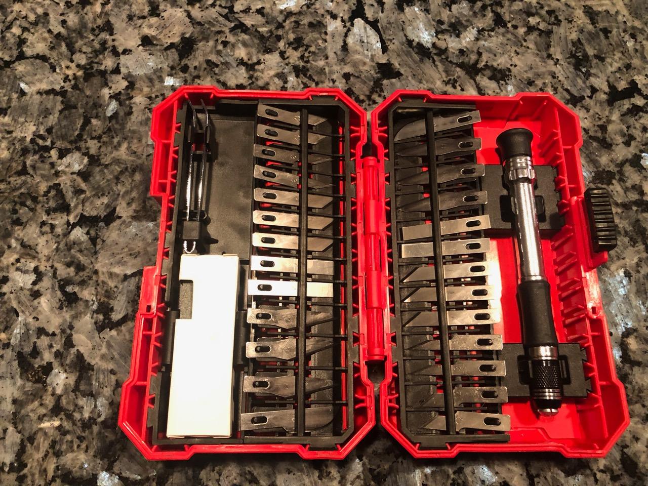 Amazon Basics 29-Piece Precision Hobby Knife Set with Razor-Sharp Blades, Modeling Tools, Anti-Slip Rubber Grip, Black, Silver, Red customer photo 1