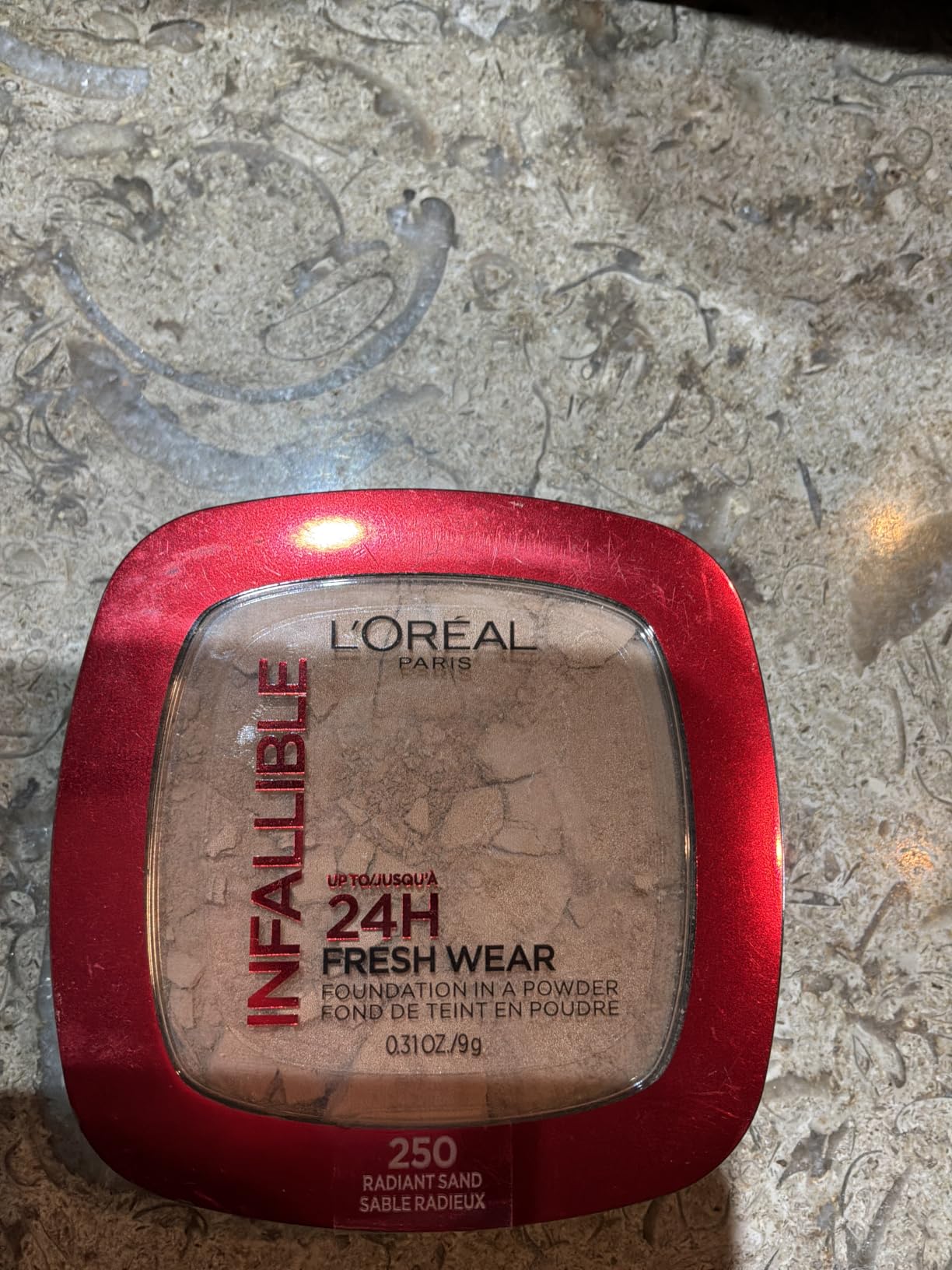 L'Oreal Paris Makeup Infallible Fresh Wear Foundation in a Powder, Up to 24H Wear, Waterproof, Ivory Buff, 0.31 oz. (Packaging May Vary) customer photo 1