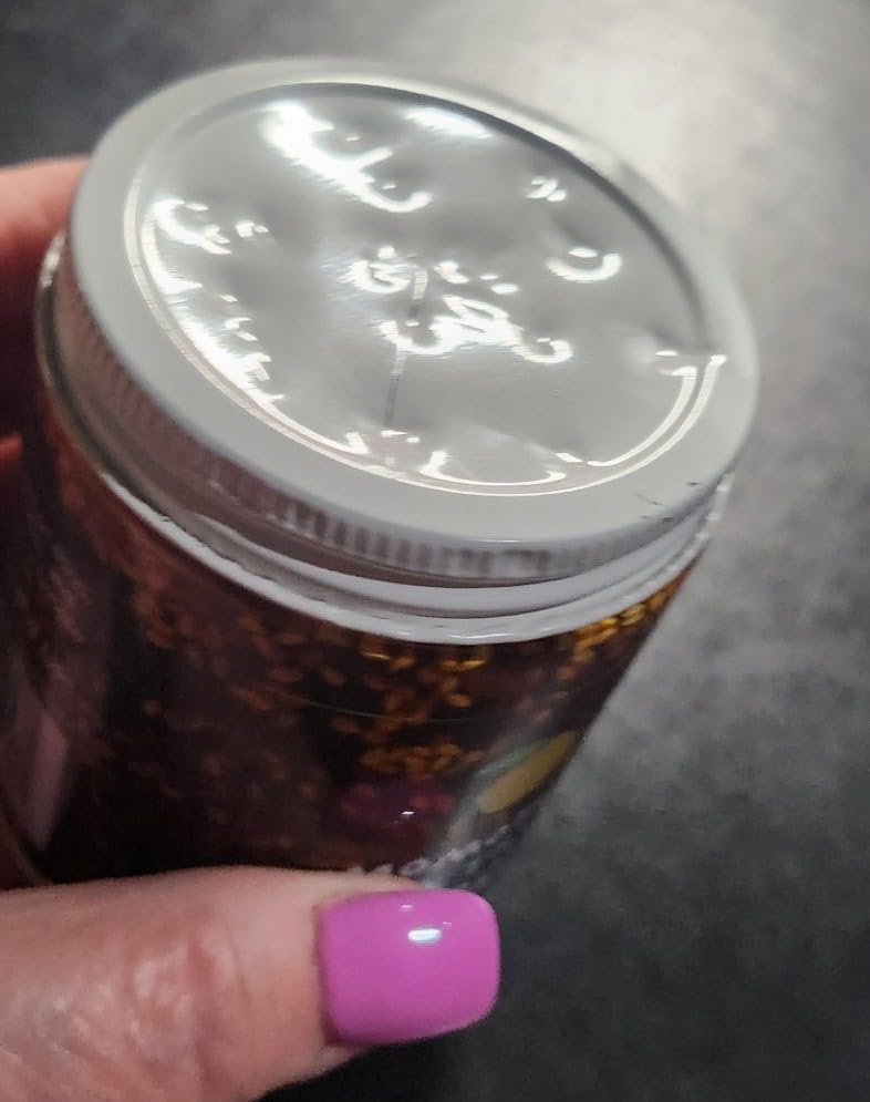 Momofuku Black Truffle Chili Crunch by David Chang, (5.5 Ounces), Chili Oil with Crunchy Garlic and Shallots, Spicy Chili Crisp with Real Truffle for Cooking as Sauce or Topping (Packaging May Vary) customer photo 1